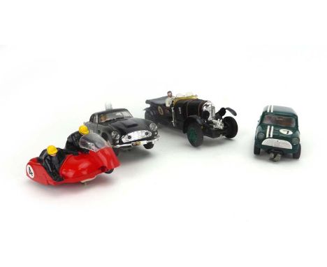 Please Note: amended estimateFour Scalextric vehicles comprising:C64 4.5L supercharged Bentley,C68 Aston Martin DB4 GT (marsh