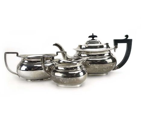 A silver three piece tea service of plain boat shaped form, maker WA, Birmingham 1928, 39 ozs CONDITION REPORT: Typical minor