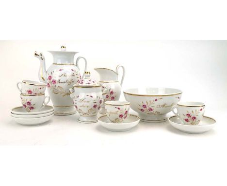 An early 19th century French porcelain part dinner service comprising: coffee pot, teapot, water jug, sugar bowl, fruit bowl,