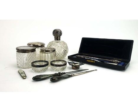 A mixed parcel of silver mounted dressing table bottles, button hooks and other items, various dates and makers (qty) CONDITI