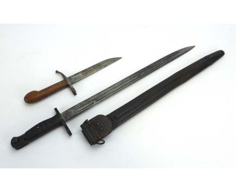 A US 1917-pattern bayonet and scabbard, together with a trench knife CONDITION REPORT: Trench knife handle presumably later.