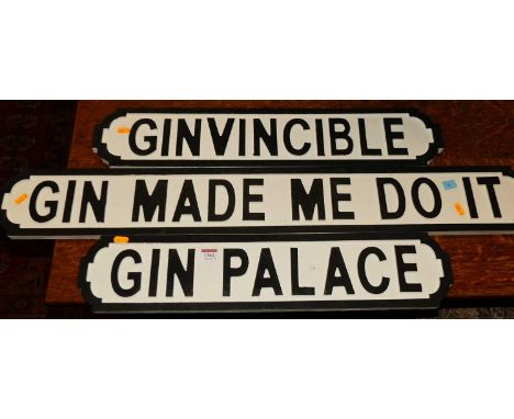 Three contemporary painted faux road style signs, titled Gin Palace, Ginvincible, and Gin Made Me Do It