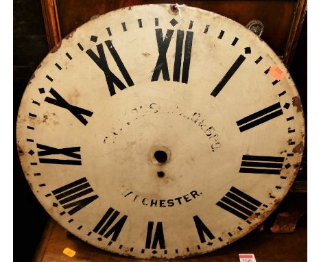 A painted iron circular Roman clock dial, indistinctly signed by a maker of Manchester, dia.45cmCondition report: Some losses
