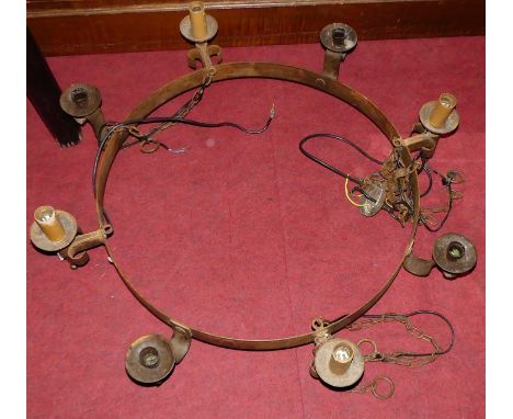 A Gothic style steel circular hanging eight-light electrolier, with ceiling rose and hanging chains, approx dia.94cm