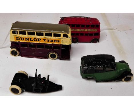 Collection of pre-war Dinky toy diecast vehicles to inc Dunlop Tyres Bus, No. 30 G taxi, and a Taylor &amp; Barratt trolleybu