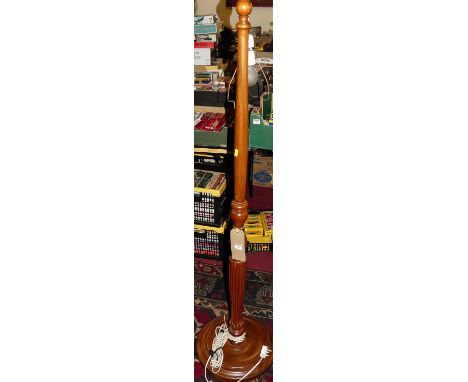 A turned beech standard lamp 