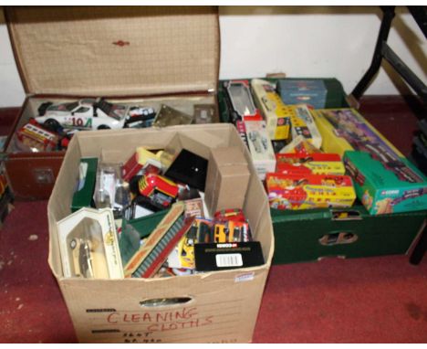 Three boxes containing a collection of various boxes and loose modern issue diecast and tin plate vehicles to include various