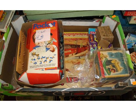 One box of mixed children's toys to include an ESL steam engine, an  ESL electric motor, a Merit Clowning puzzle, a Triang Ra