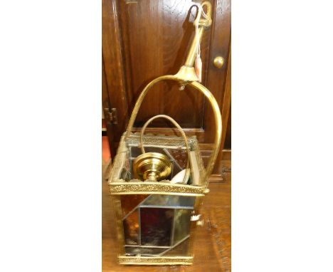 An early 20th century brass and coloured leaded glass inset square hanging ceiling light, with rose attachment