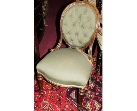 A set of four 19th century French walnut fabric button back upholstered salon side chairs