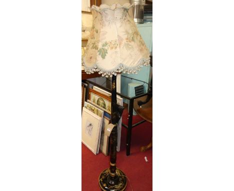 A chinoiserie black and gilt decorated standard lamp with shade 