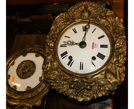 A 19th century provincial French comtoise wall clock, the white enamel dial with embossed gilt metal surround, twin winding h