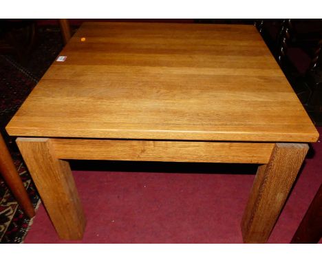 A contemporary light oak square low coffee table, w.65cm 