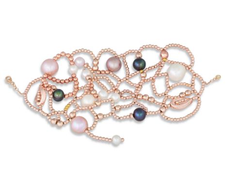A PEARL BRACELET, laced beaded style to a gold clasp