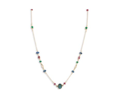 A RUBY, EMERALD AND SAPPHIRE NECKLACE, the 18ct chain set with beaded and faceted gemstones to a central cabochon sapphire