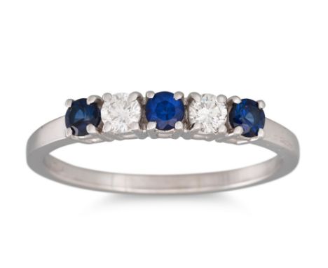 A SAPPHIRE AND DIAMOND FIVE STONE RING, mounted in 18ct white gold. Estimated: weight of diamonds: 0.20 ct, sapphire: 0.33 ct