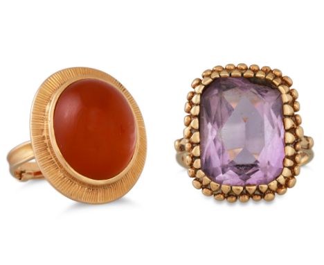 A CARNELIAN AND GOLD RING, together with an amethyst and gold ring, (amethyst damaged). Both size: L