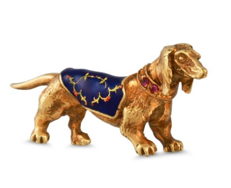 AN 18CT GOLD NOVELTY BROOCH, modelled as a daschund, enamel body, &amp; ruby collar