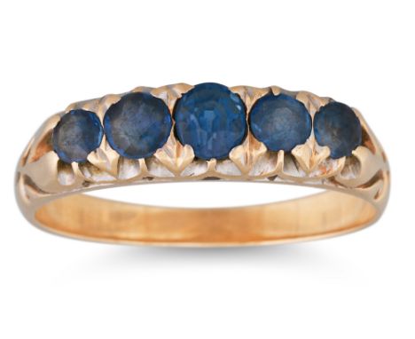 A VINTAGE SAPPHIRE DRESS RING, the graduated five stone ring mounted in 15ct gold, size R, 4 g.