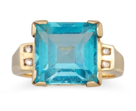 A TOPAZ RING, to diamond shoulders, in 14ct yellow gold. Size: I