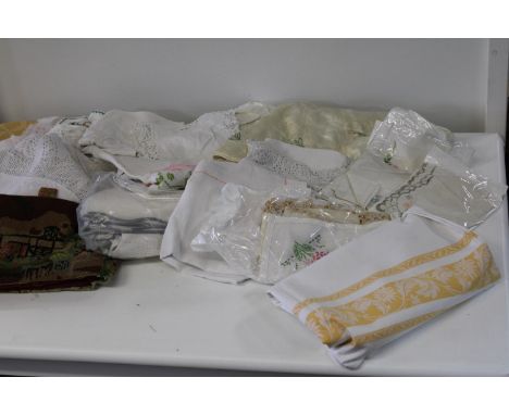 A box of vintage linen &amp; table clothes etc 