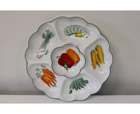 A Royal Worcester vegetable plate 34cm in dia 