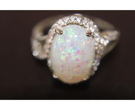 A silver &amp; faux opal ring 