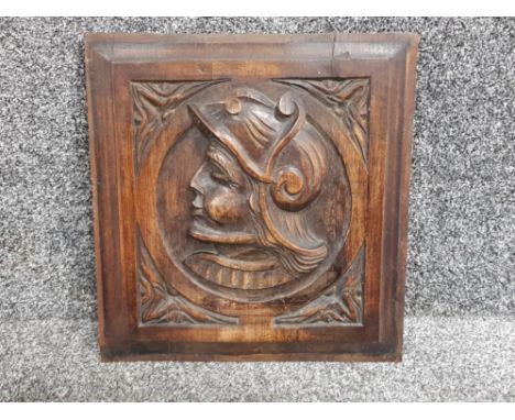 Late Victorian to early 1900s oak carved panel of a classical figure with helmet.