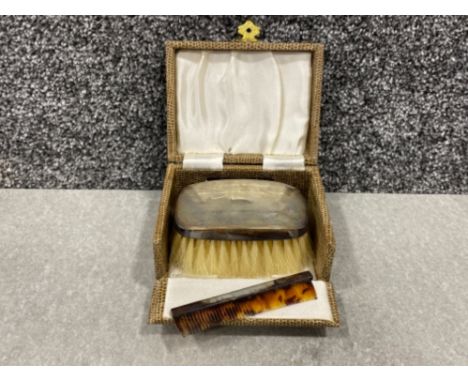 Sterling silver brush and comb set in original case.