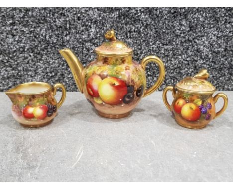 Royal Worcester handpainted 3 piece associated miniature tea set signed Roberts and A Shuck with fruit decoration teapot 8.5c