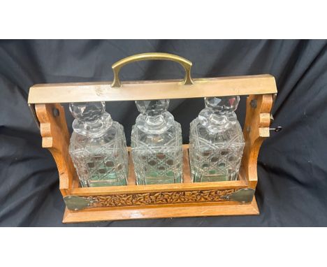 Vintage 3 decanter tantalus, with key 