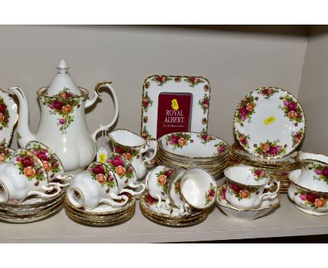 A QUANITY OF ROYAL ALBERT OLD COUNTRY ROSES TEA AND DINNER WARES, ETC, SOME FIRSTS, MAJORITY SECOND QUALITY, includes nine di