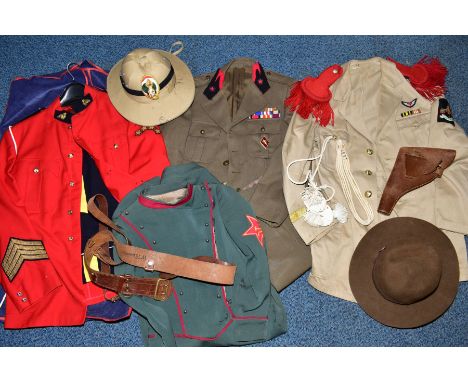 A BOX CONTAINING FOUR ITEMS OF MILITARY/POLICE UNIFORM, to include Female Russian /male Russian/French/RCMP Uniform Hat etc&n