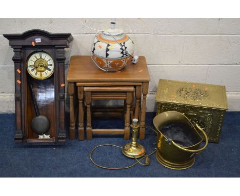 A DISTRESSED AND DISMANTLED VIENNA WALL CLOCK (losses) together with an oak nest of tables, pottery 1970's table lamp, brass 