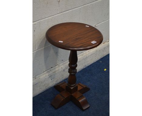 AN OLD CHARM OAK CIRCULAR TOPPED LAMP TABLE, diameter 38cm x height 57cm