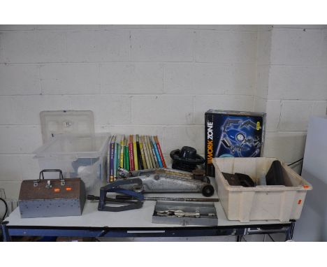 A COLLECTION OF AUTOMOTIVE TOOLS AND LITERATURE including a Trolley Jack, Hub Puller, Paintwork polisher, Air tool kit, a met