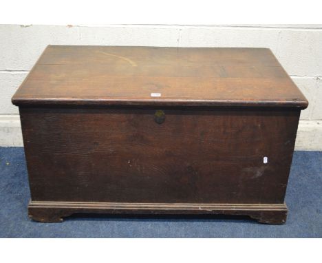 A GEORGIAN PLAIN OAK COFFER, with twin iron handles, bracket feet, width 100cm x depth 58cm x height 53cm