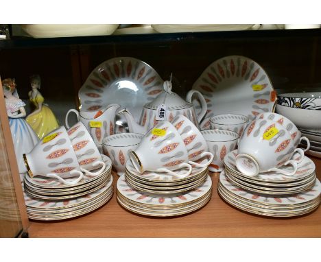 A ROYAL ALBERT 'SAFARI' TEASET, comprising teapot, two cake/sandwich plates, milk jug, two sugar bowls, ten teacups, twelve s
