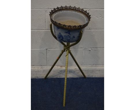 A LATE 20TH CENTURY ORIENTAL STYLE CRACKLE GLAZE BLUE AND WHITE POTTERY JARDINIERE, on a seperate brassed tripod base, diamet