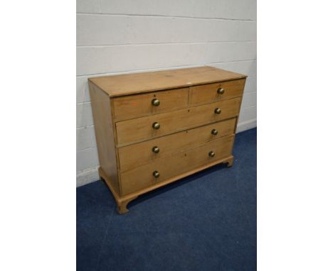 A 19TH CENTURY PINE CHEST OF TWO SHORT OVER THREE LONG DRAWERS, with turned brass handles on bracket feet, width 134cm x dept