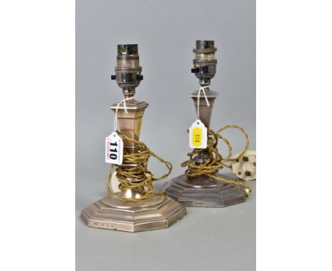 A PAIR OF GEORGE V SILVER MAPPIN AND WEBB TABLE LAMPS, of candlestick form, square tapering stem to an octagonal loaded base,