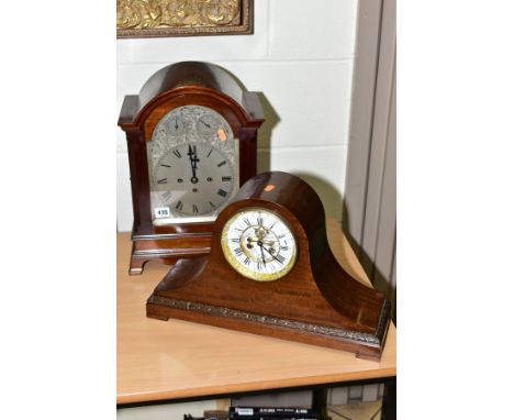AN EARLY 20TH CENTURY MAHOGANY CASED BRACKET CLOCK, arched top above a foliate engraved silvered dial with chime/silent and s