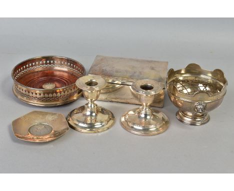 A PARCEL OF SILVER, including a pair of dwarf candlesticks, circular loaded bases, one damaged to stem, an Edwardian silver r