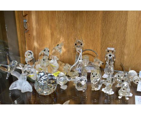 A COLLECTION OF SWAROVSKI CRYSTAL DOG, CAR AND BIRD FIGURES, with a mirrored stand, including Owl, Kiwi Hummingbird, Poodle, 