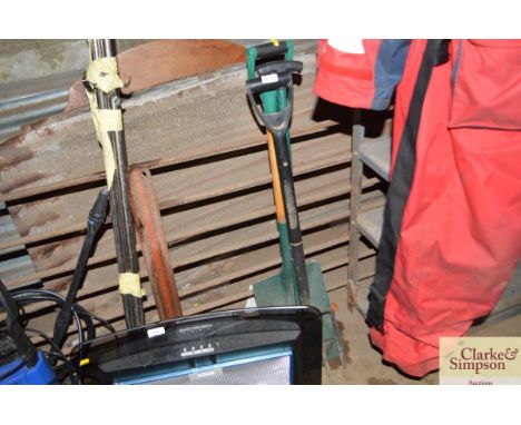 A garden spade; an edger; and a garden fork