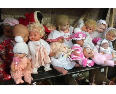 SHELF OF VARIOUS CHILDREN'S DOLLS