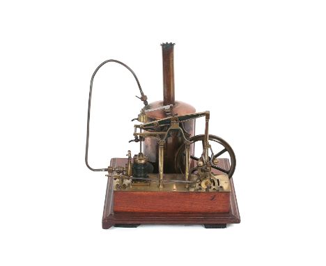 A BRASS MODEL OF A SINGLE CYLINDER FOUR PILLAR BEAM ENGINE, by Lucas and Davis, circa 1870,with copper boiler on the same mah