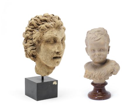 A French terracotta bust of a young child on porphyry soccle base together with a stone head fragment of a youththe first pro