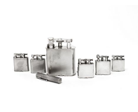 A quantity of silver and plated lightersDunhill and other makersComprising: two Dunhill 'Unique' pattern silver lighters, mak