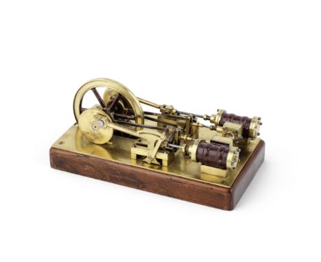 A brass model of a twin cylinder mill engine, 20th century,steam is supplied centrally to each inward-facing valve chest, the